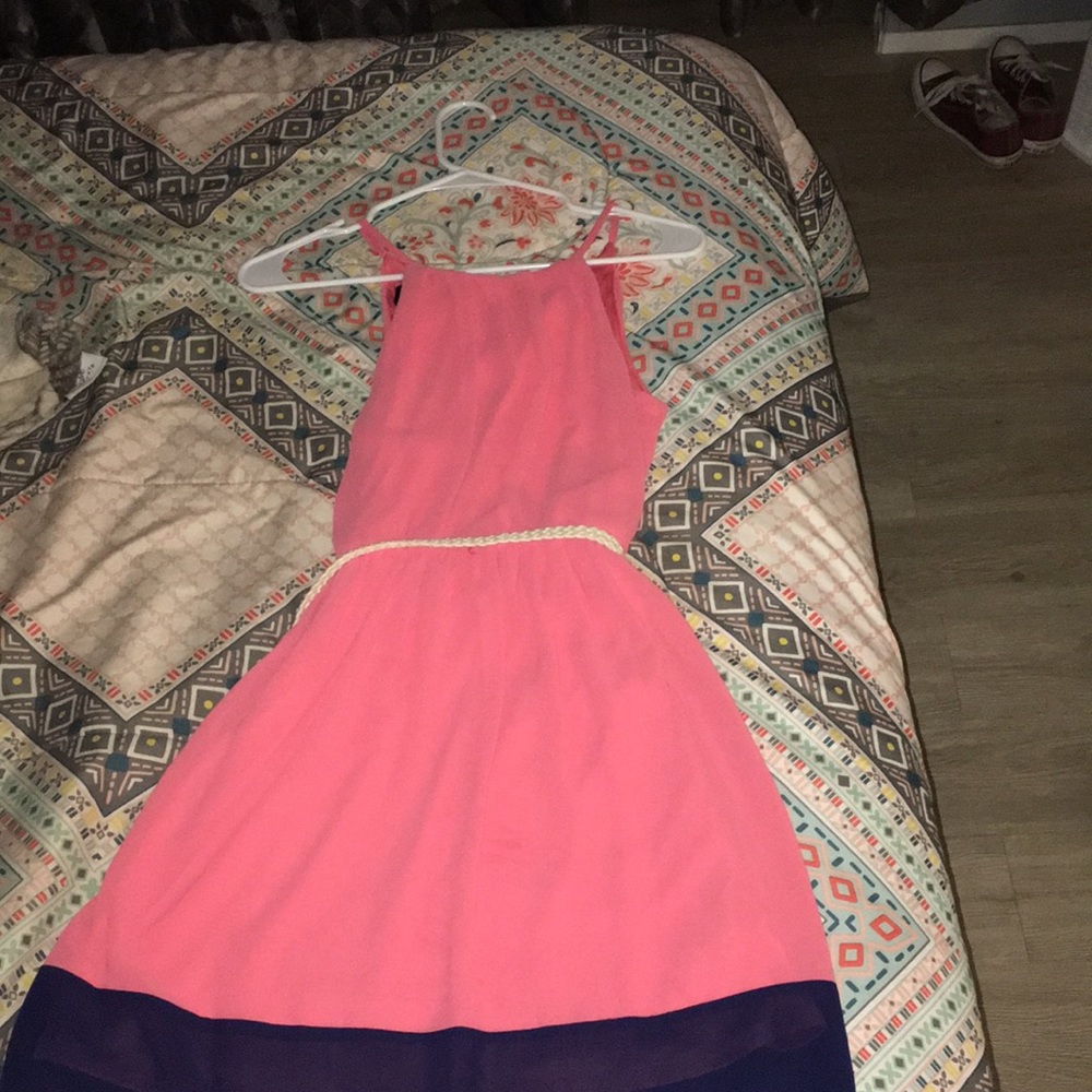 Pink dress with blue trim that comes with a belt